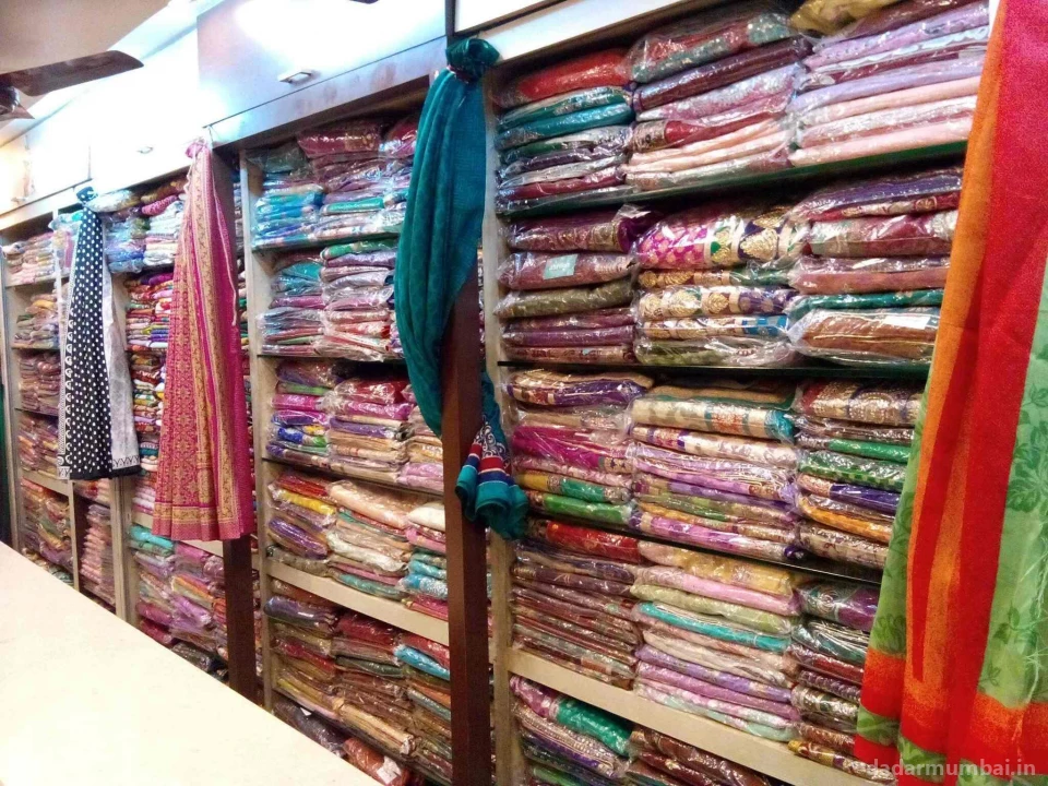 Shraddha Exclusive Saree & Dress Material Photo 7